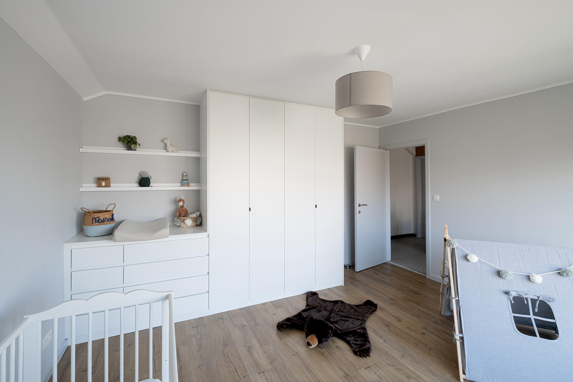 Bespoke wall unit for the baby nursery in white