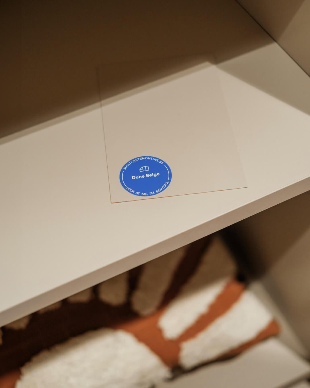 Colour sample Dune Beige in the walk-in dressing in teenager's room at Sundae Huis
