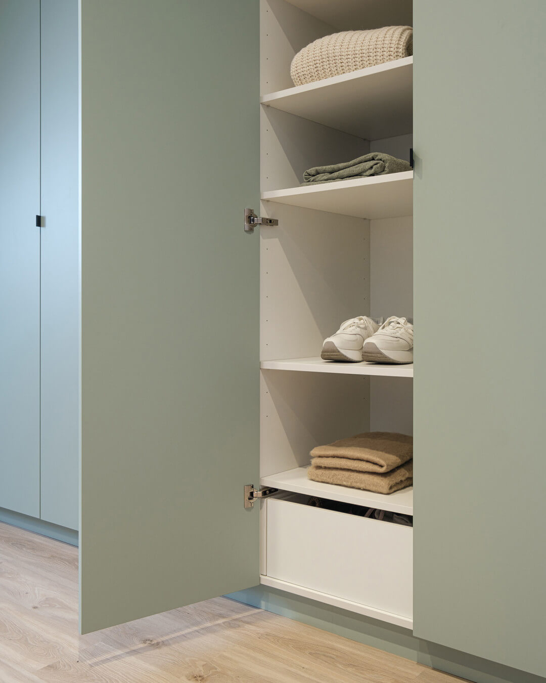 Bespoke cupboard under a sloped roof