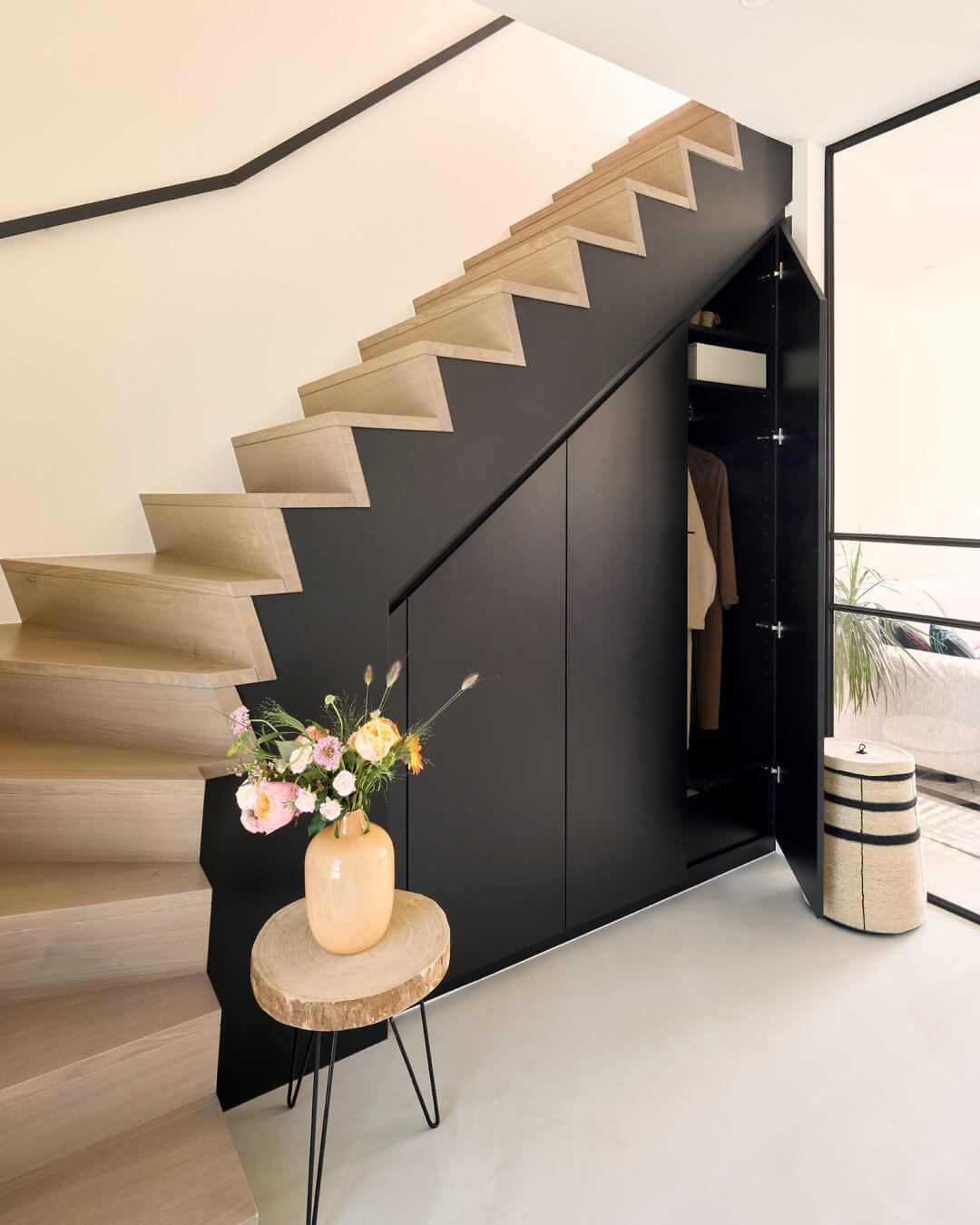 Custom under-stair closet in Diamond Black by Maatkasten Online