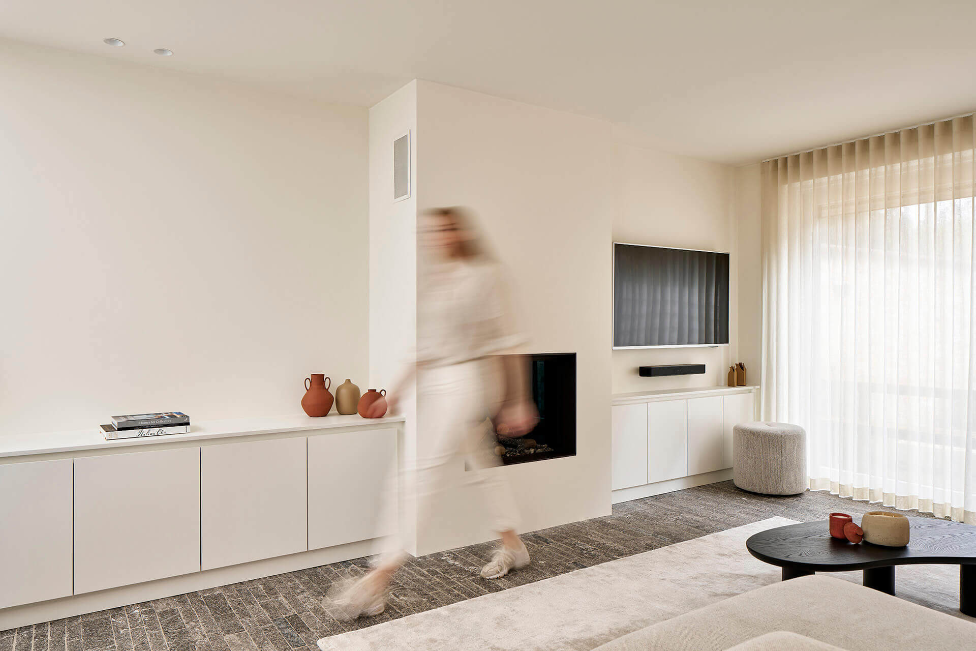 Bespoke white dressers in living room
