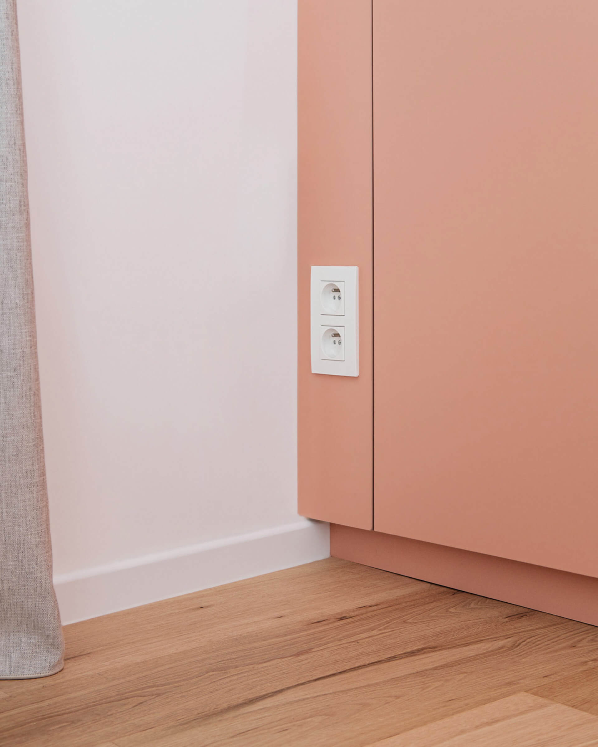 Incorporating electrical outlets into a custom cabinet