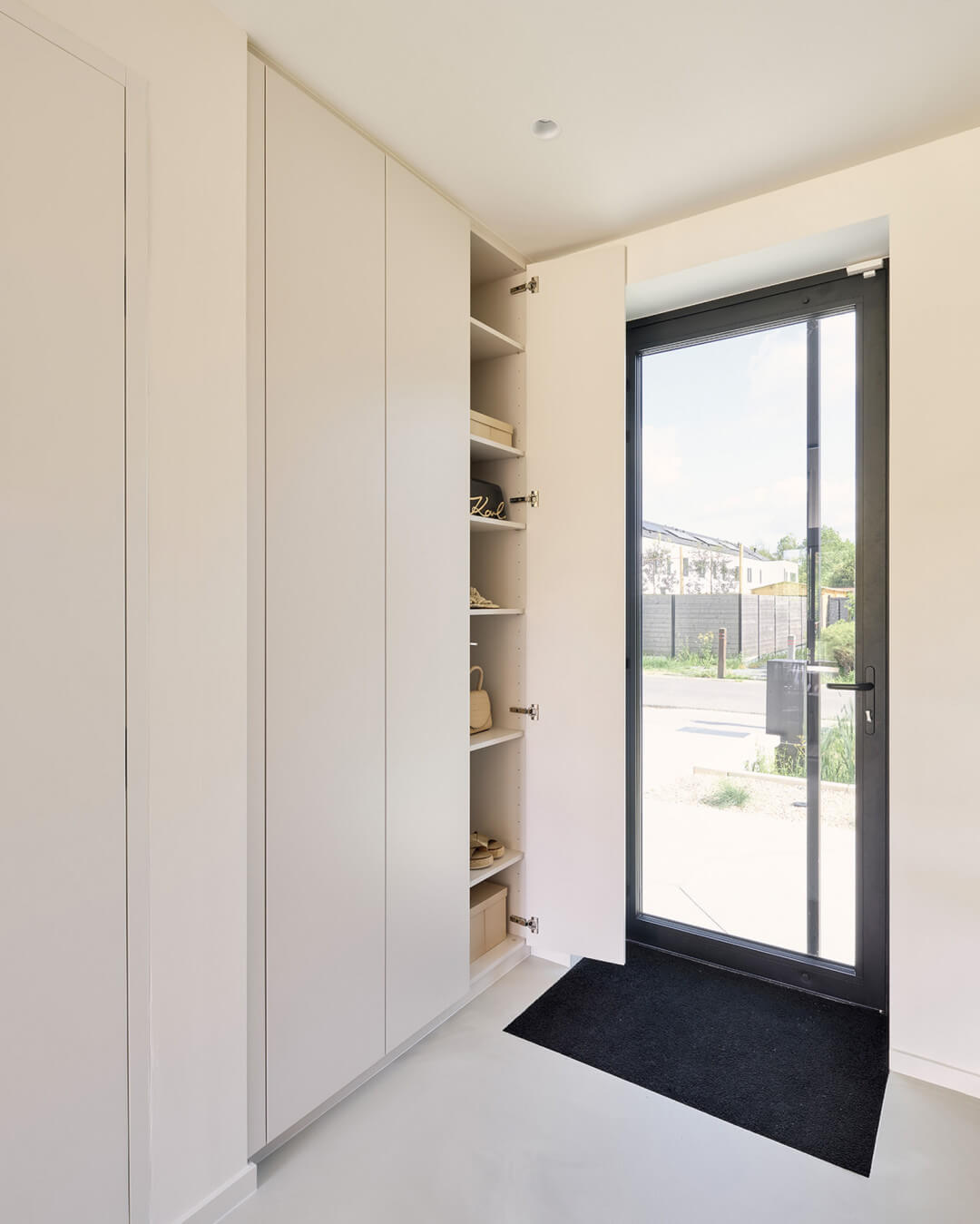 Custom wardrobe in Seashell for the entryway.