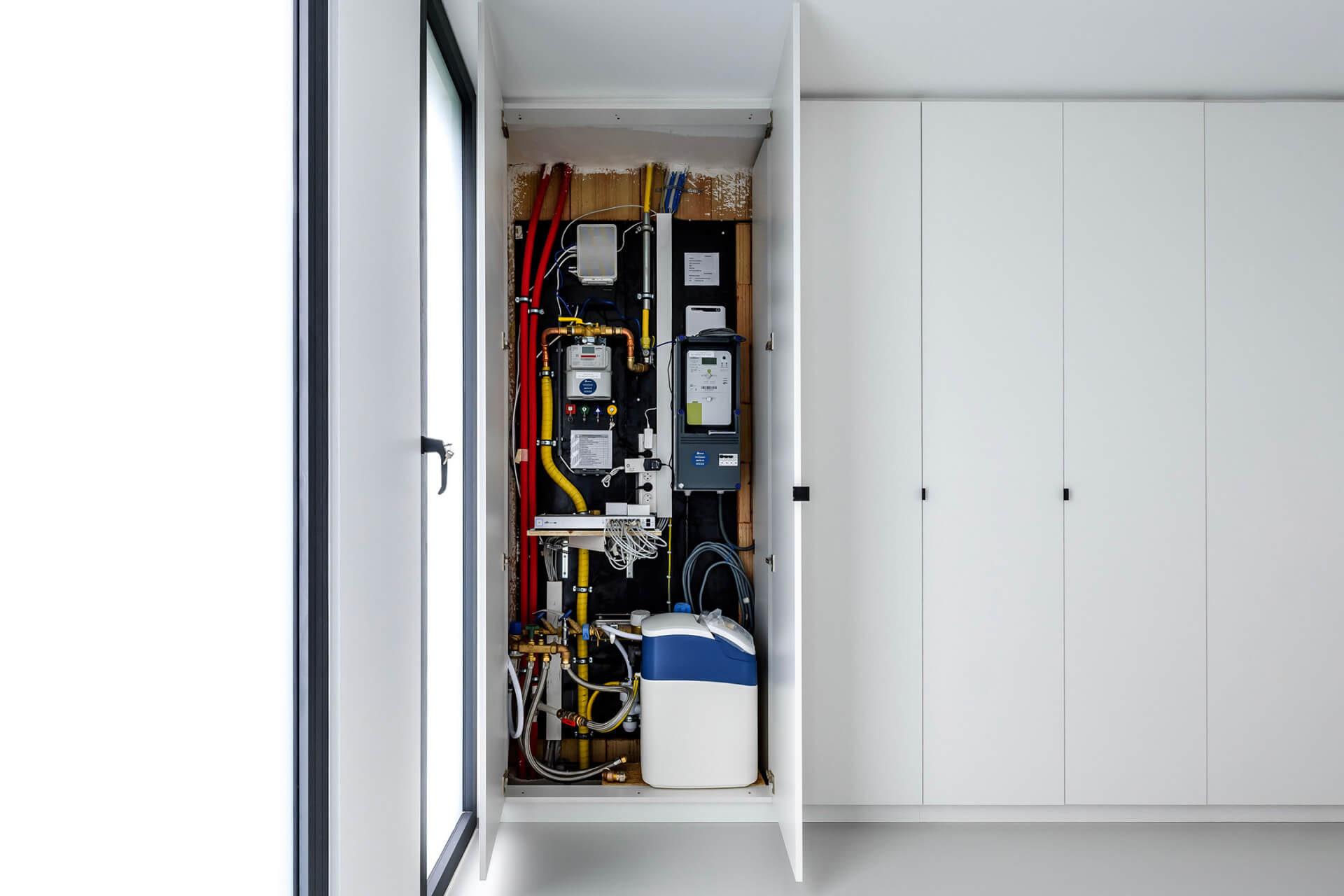 Hide unsightly pipes and wires with a bespoke technical cabinet