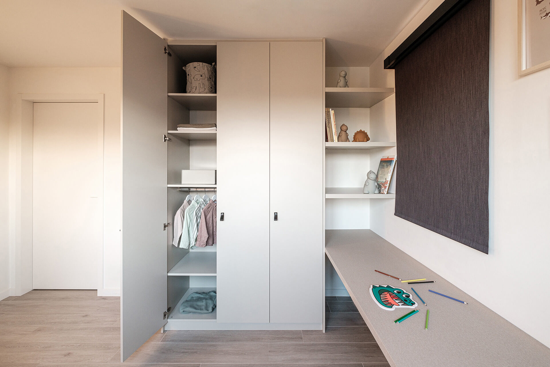  Custom wardrobe with a matching desk tablet for the children's room.
