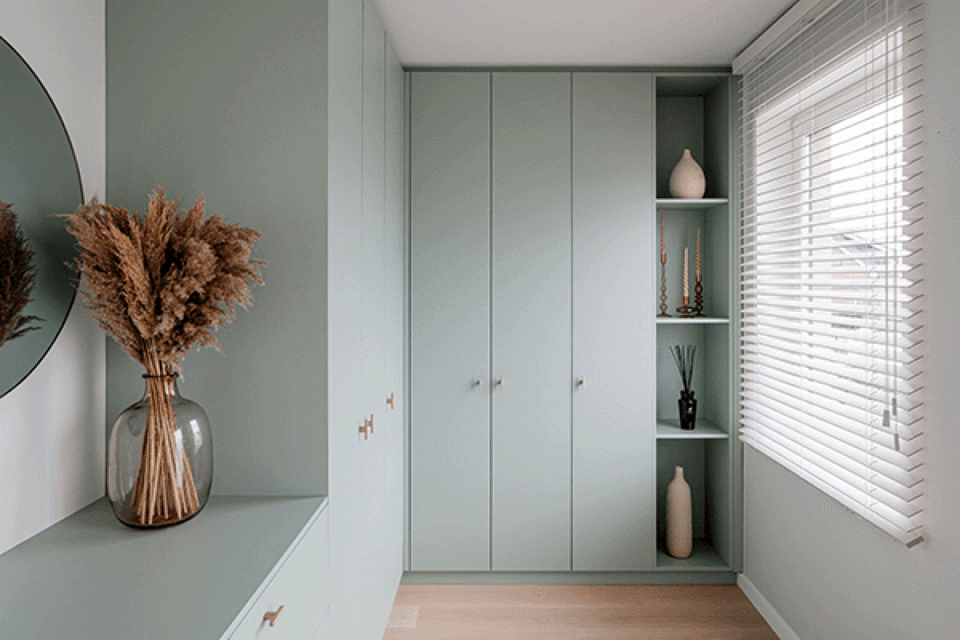 Custom corner cabinet in Industrial Green with T-Diamond brass handles.