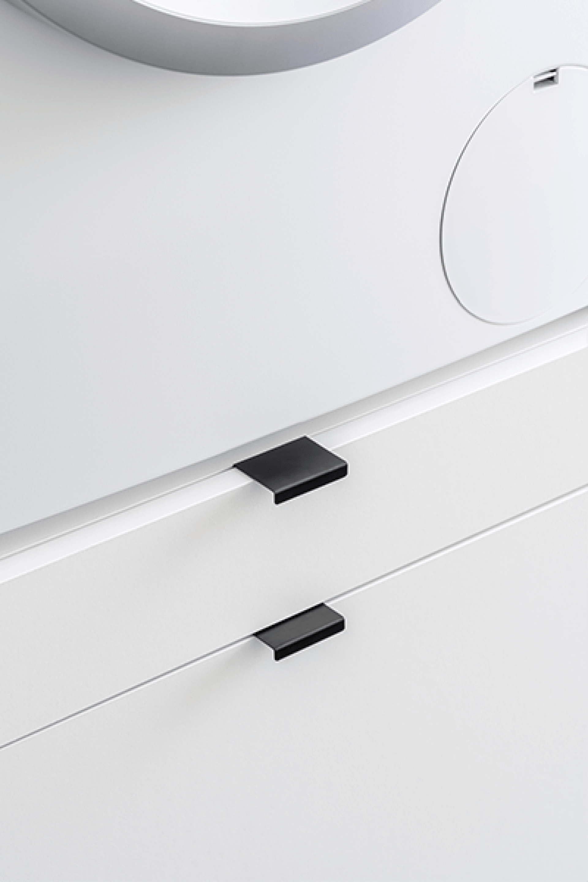 Detail shot of a custom-made Front White laundry cabinet onto which black Mini Pure handles were mounted.